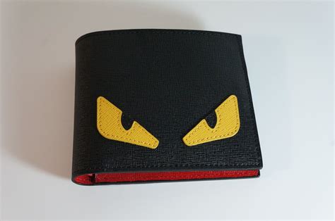 fendi monster mini leather wallet on chain|Fendi monster eyes bifold wallet.